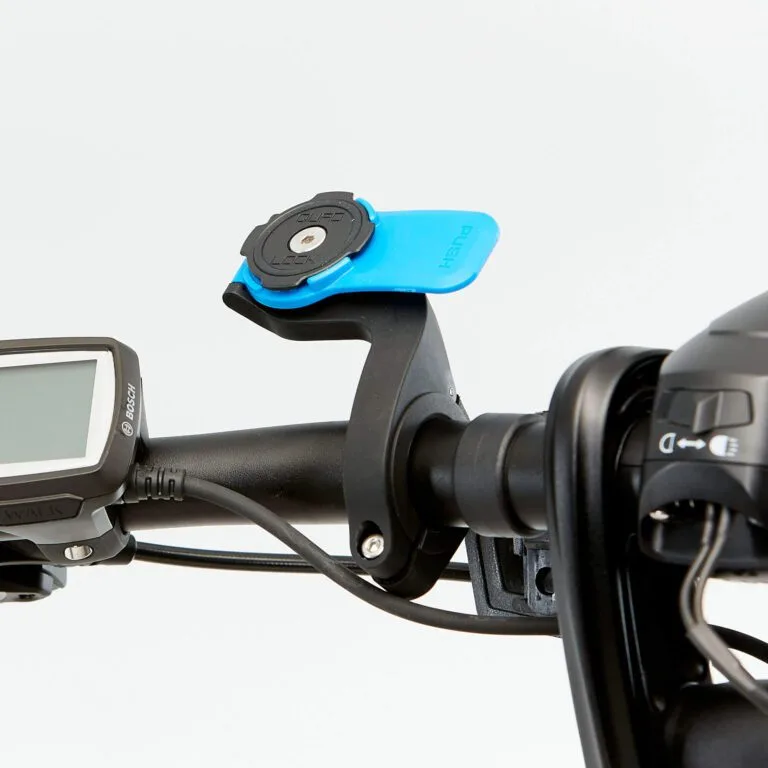 The Quad Lock Out Front Mount is a sleek and innovative smartphone mount designed for cyclists and outdoor enthusiasts. With its easy-to-install system and secure locking mechanism, it keeps your phone safe and easily accessible while you ride. The mount attaches to your bike's handlebars and positions your phone in a convenient location, making it easy to use GPS and track your fitness goals. Its durable design and compatibility with a variety of phone models make it a versatile and reliable accessory for any cycling adventure.